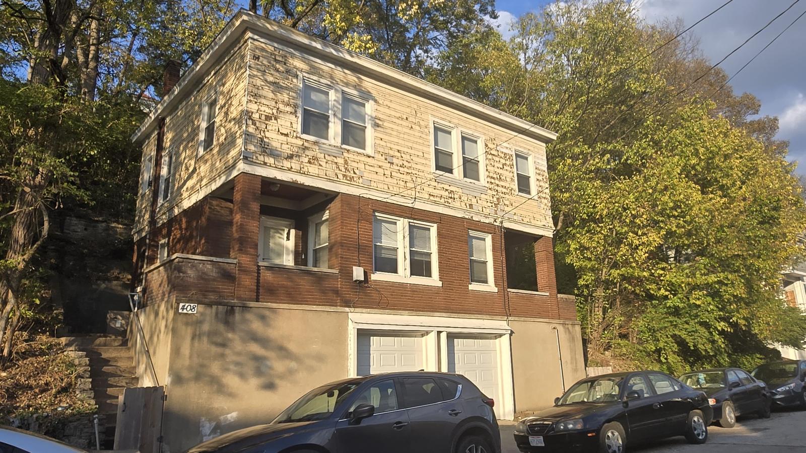 Hillside Duplex Restoration — before painting