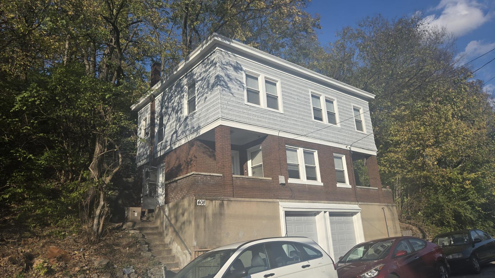 Hillside Duplex Restoration — after painting
