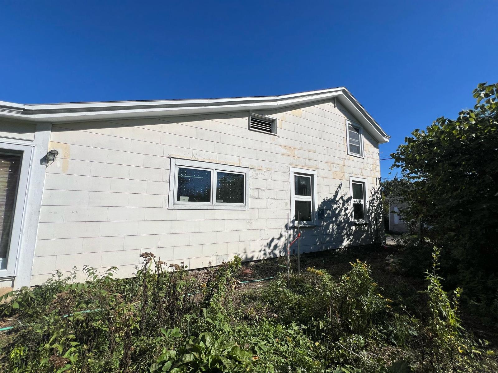 Two-Story Exterior Repaint — before painting