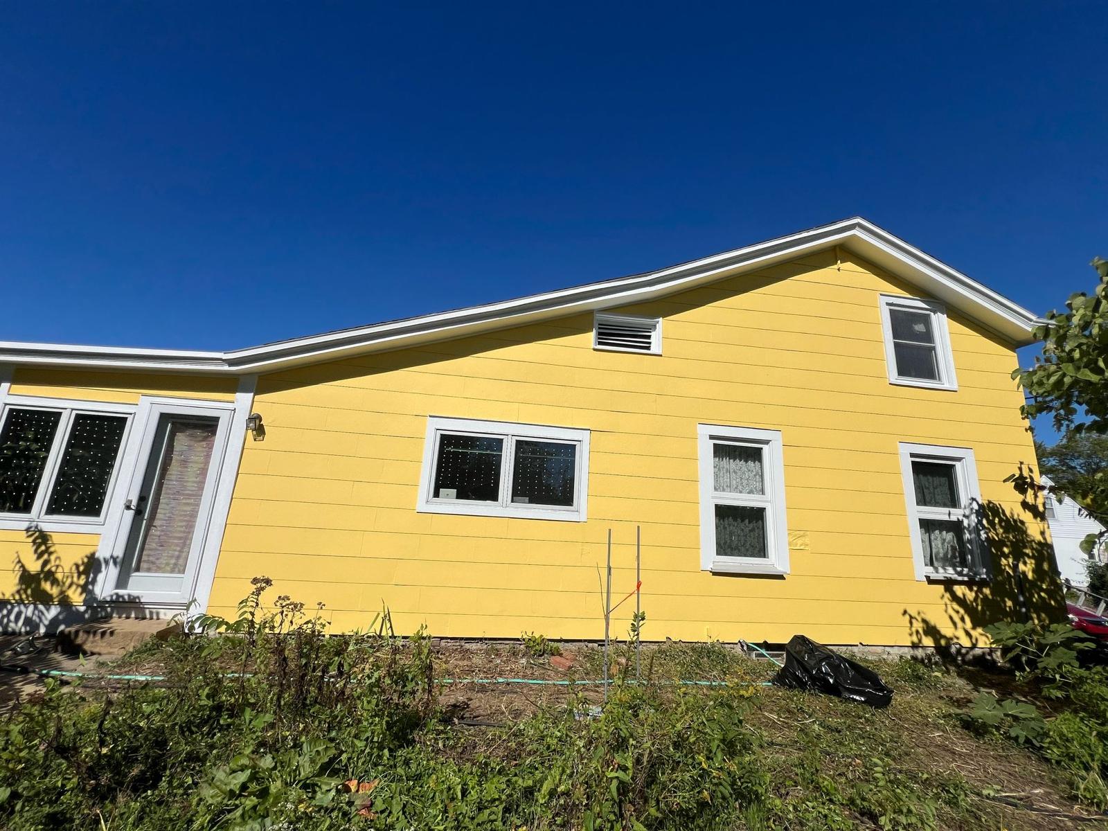 Two-Story Exterior Repaint — after painting