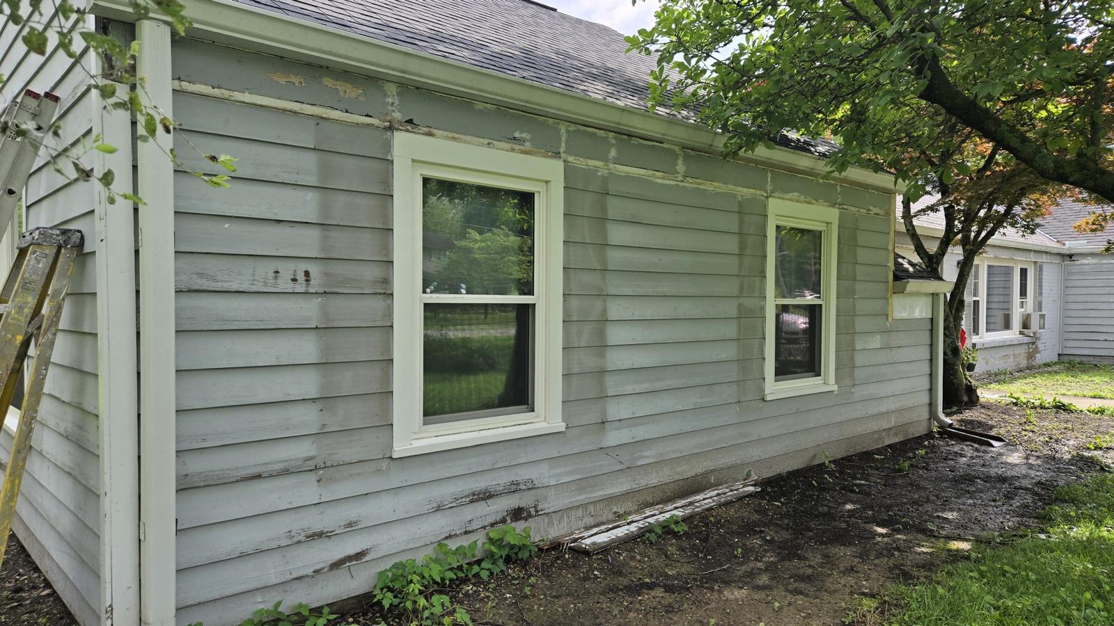 Bungalow Siding Restoration — before painting